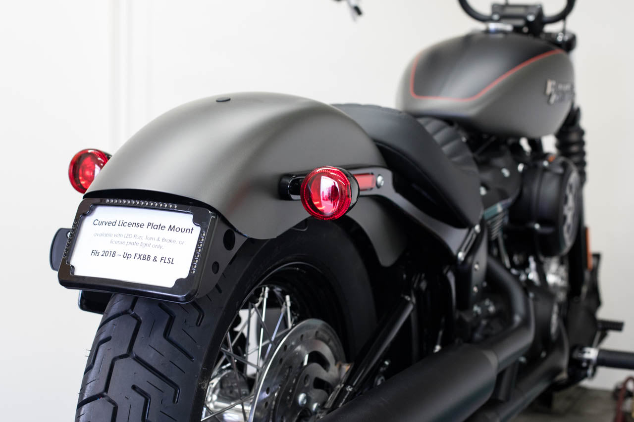 Curved License Plate Relocation For Softails