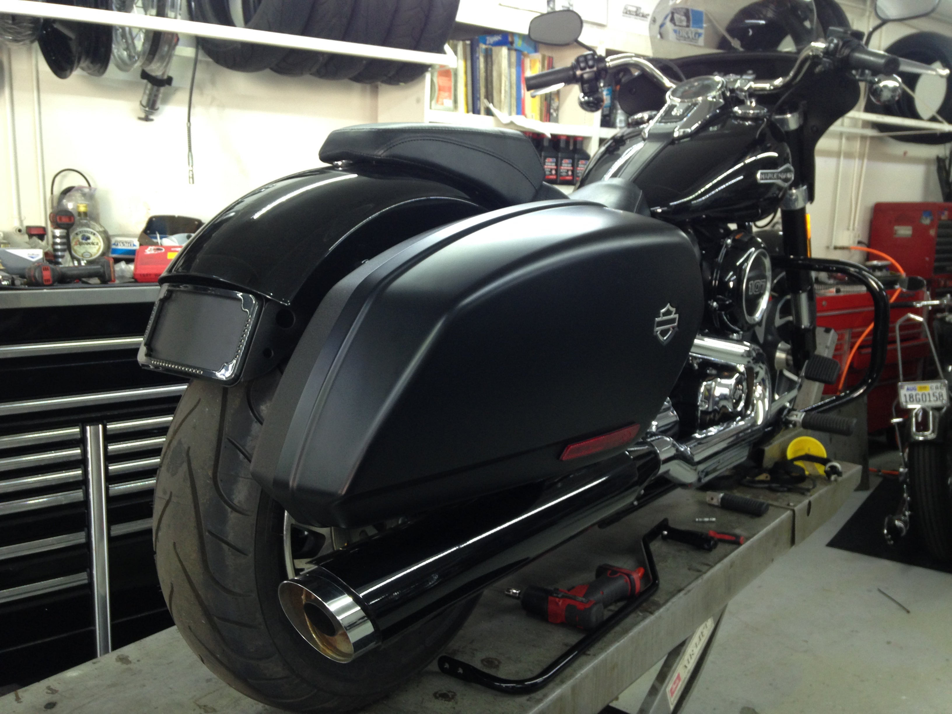 Curved License Plate Relocation For Softails